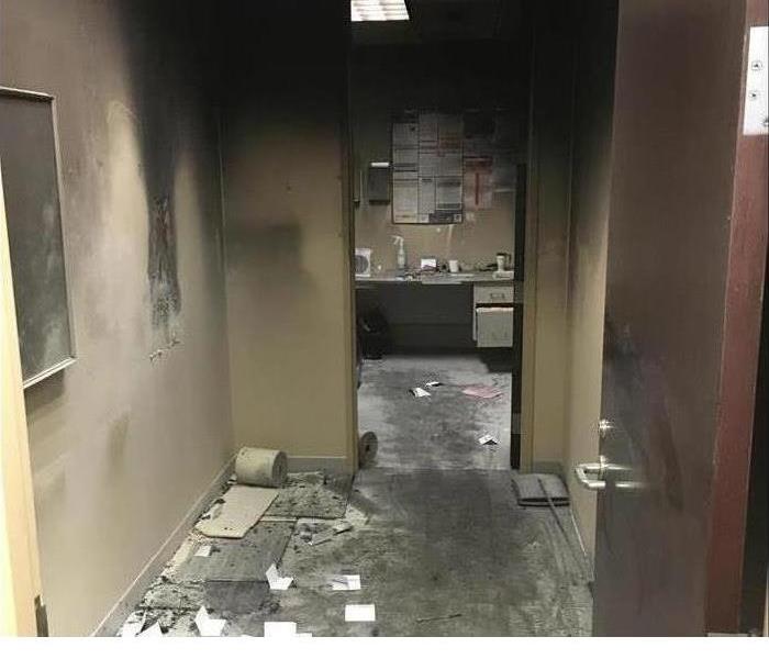 Ashes and debris in an office with fire damage in Ventura, California