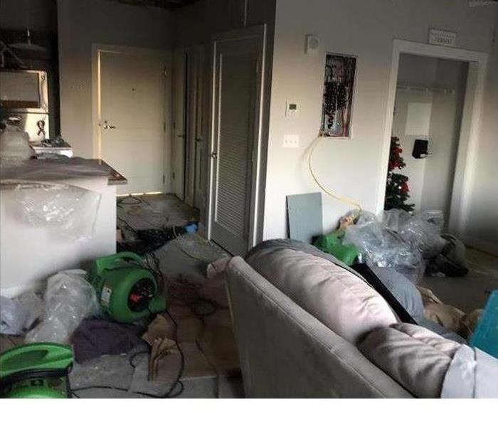 customer's wet contents including clothing and furniture